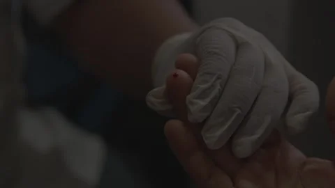 Doctor doing blood test for  in testing lab Stock Footage 253789769