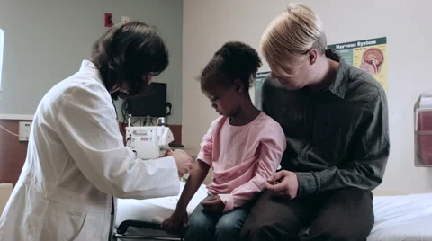 Doctor Doing Exam On Children In Medical... | Stock Video