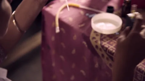 Doctor is doing Hemoglobin test using hemoglobinometer Stock Footage 162077948