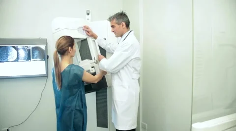 Doctor doing a mammography Stock Footage 56764600
