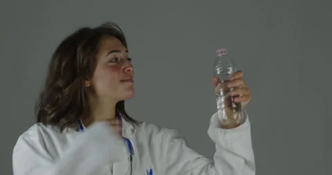 Doctor drinks water, emphasizes often-neglected hydration importance Stock Footage 250502129