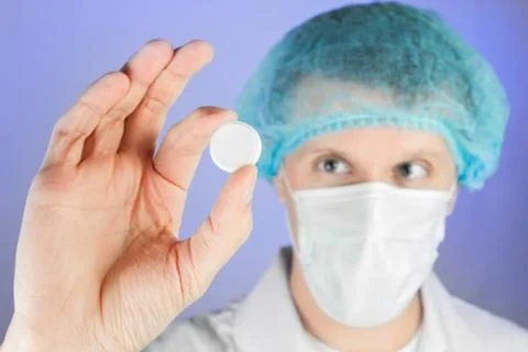 Doctor examines a tablet Stock Photos