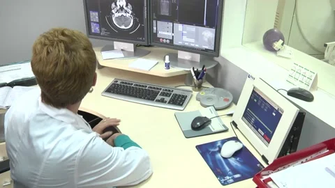 The doctor examines the tomography Stock Footage 130793989