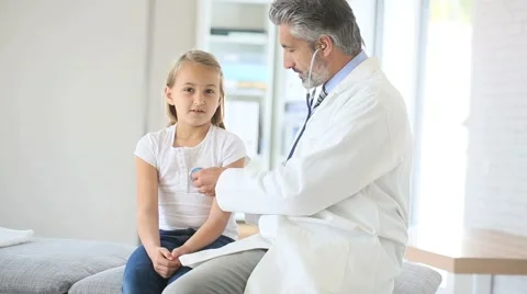 Doctor Examining Teen Girl