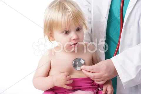 Doctor Exams Baby Girl With Stethoscope