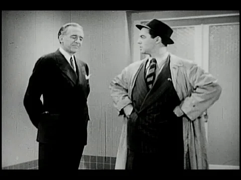 Doctor explain the basic principles of first aid to man - 1942 Stock Footage 97573918