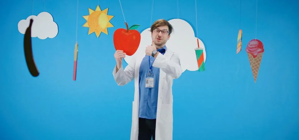 Doctor explaining difference between healthy and unhealthy food Stock Photos