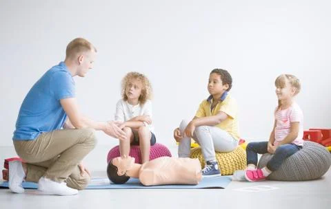 Doctor explaining first aid steps Stock Photos