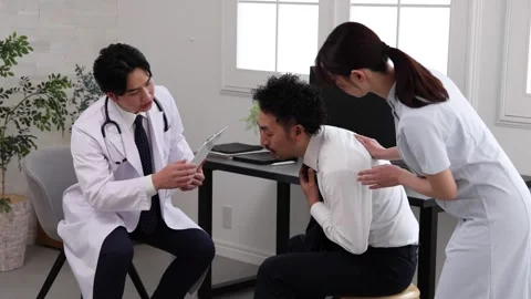 Doctor Explaining Medical Document to Patient with Nurse Support Stock-Footage 344085628