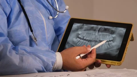 Doctor is explaining x-ray results Stock Footage 247089149
