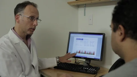 Doctor explains results Stock Footage 129473812