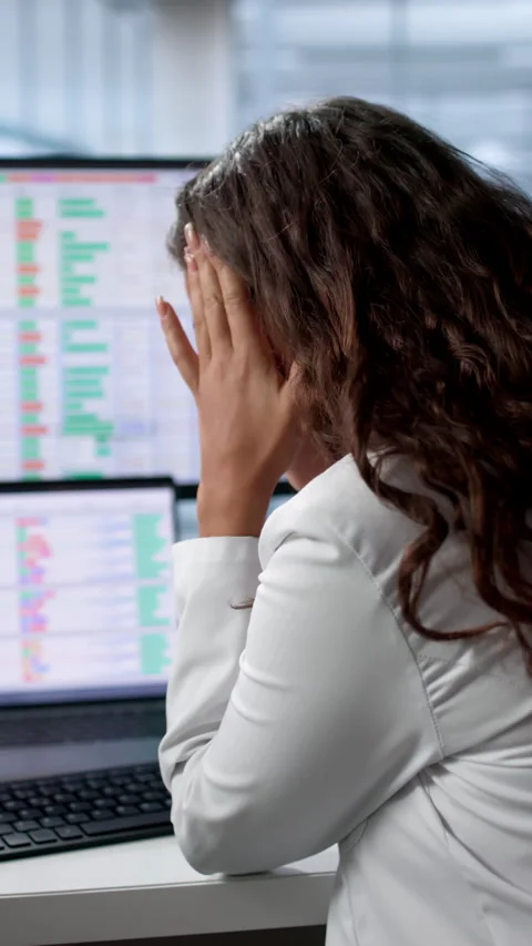 Doctor Feeling Frustrated While Using Computer Stock Footage 336377944