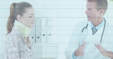 Doctor finishing notes palpating neck, checking fit of brace while medical Stock Footage 331235904