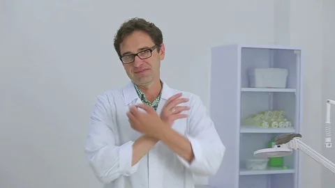 Doctor friendly looking into the camera Stock Footage 70512121