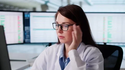 Doctor Frustrated At Multiple Spreadsheet Errors In Clinic Stock Footage 322867469
