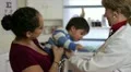 Doctor getting ready to check boy HD Footage