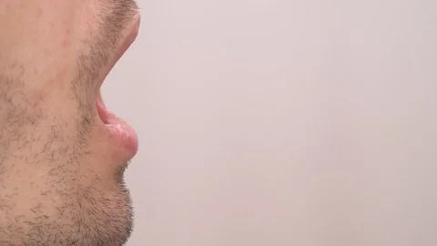 Doctor getting saliva test sample using a swab in medical laboratory. Close-up Video stock 110268319