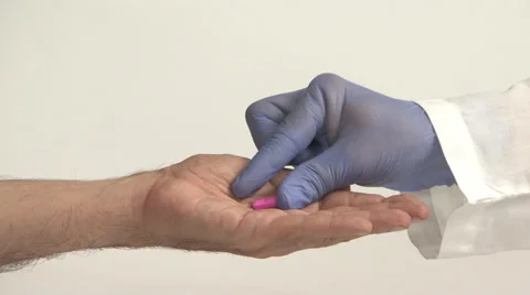 Doctor giving medicine dose to patient Stock Footage
