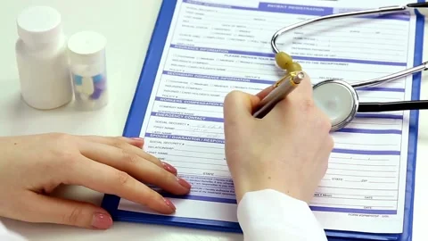 Doctor GP filing a document in an office. and healthcare concept. and hands Stock-Footage 336587664
