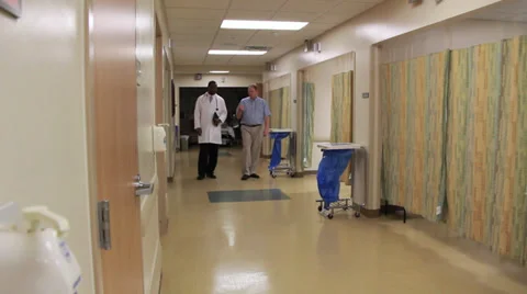 Doctor in hallway Stock Footage 32885376