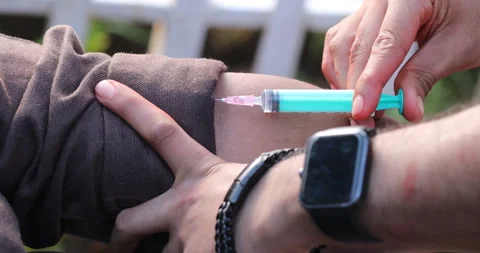 Doctor Hand with Injection Stock Footage 335692558