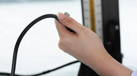Doctor hand pumping old version blood pressure Stock Footage 51802618