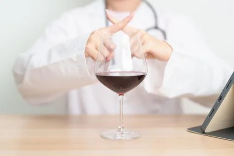 Doctor hand stop to refuse Wine, quitting drink for healthy liver, prevent .. Stock-Fotos