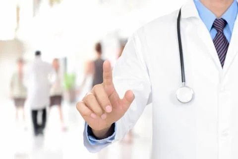 Doctor hand touching on empty virtual screen Fotos de archivo