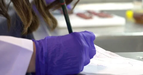Doctor hand writing Stock Footage 86567298