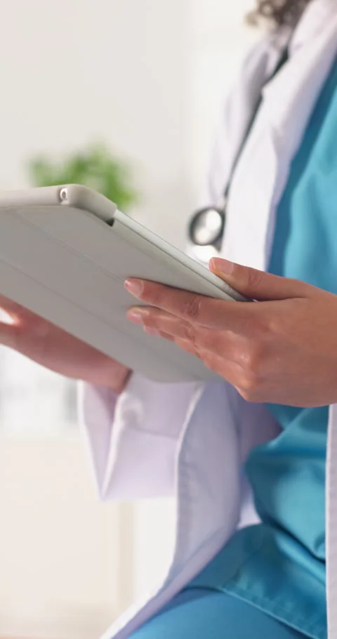 Doctor, hands and scroll in office with tablet, medical research and email for Video stock 342001192
