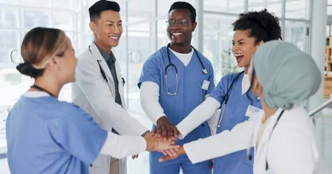 Doctor, hands or stack in teamwork motivation, collaboration or cheering in Foto stock