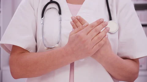 Doctor hands presenting a virtual copy space for a message or product Video stock 141953769