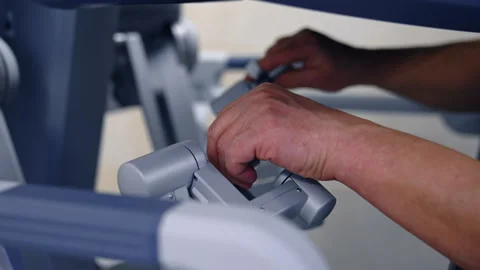 Doctor hands remoting surgery robot Stock Footage 266455399