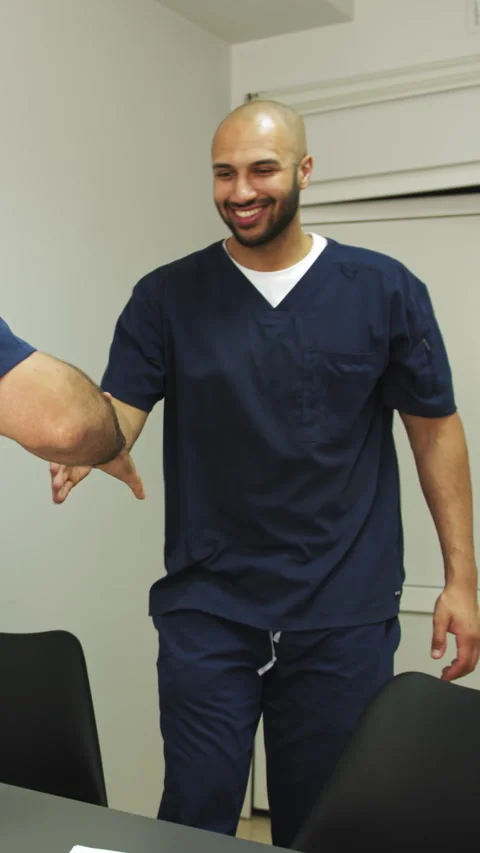 Doctor Handshake, Vertical Video Stock Footage 316202377