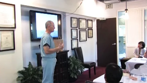 Doctor is having a lecture for audience Stock-Footage 127000897