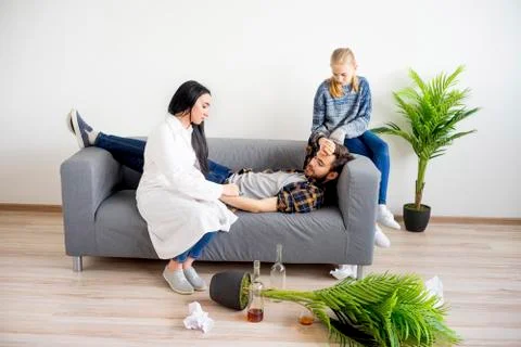 Doctor helping an alcoholic Stock Photos