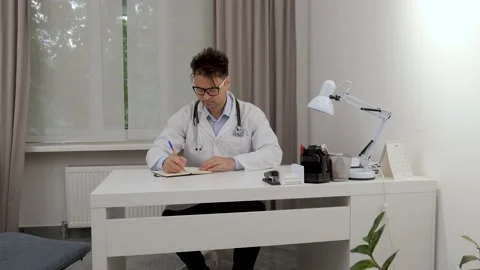 Doctor in his office Stock Footage 197707464