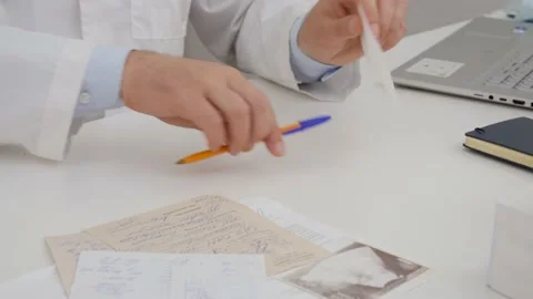 Doctor in his office Stock Footage 201214729