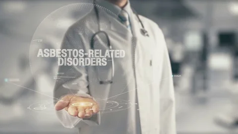 Doctor holding in hand Asbestos-Related Disorders Stock Footage