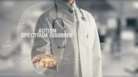 Doctor holding in hand Autism Spectrum Disorder Stock Footage