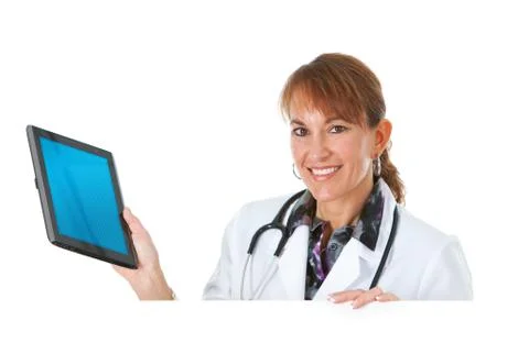 Doctor: holding a tablet computer behind white card Stock Photos