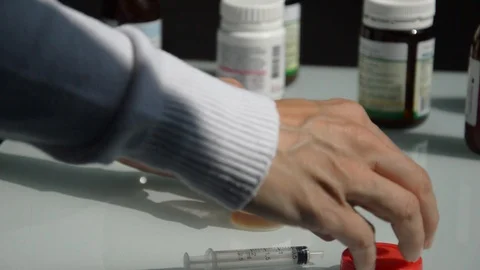 Doctor with injection Stock Footage 94378412