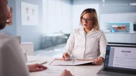 Doctor Interviews New Candidate Stock Footage 332907406