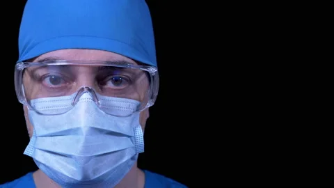 Doctor looking at camera close up 스톡 동영상 146874101