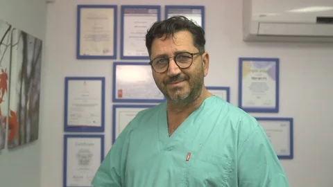 Doctor looking at camera Stock Footage 113189087