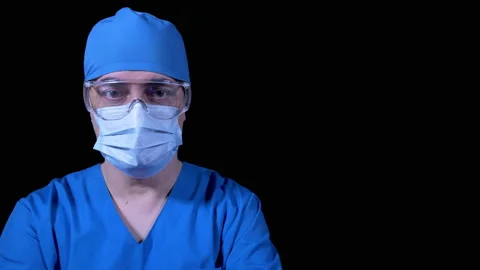 Doctor looking at camera Stock Footage 146873999