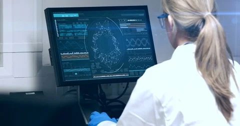 Doctor looking dna molecule on computer 스톡 동영상 75236341