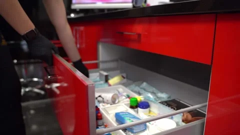 Doctor looking in a drawer Stock Footage 307556114
