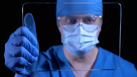 Doctor Looking Tablet  Stock Footage 146875365
