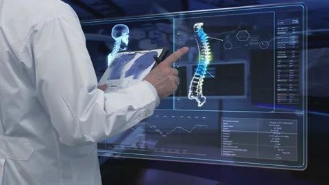 Doctor Looking X-ray Data  Stockbeeldmateriaal 200166925